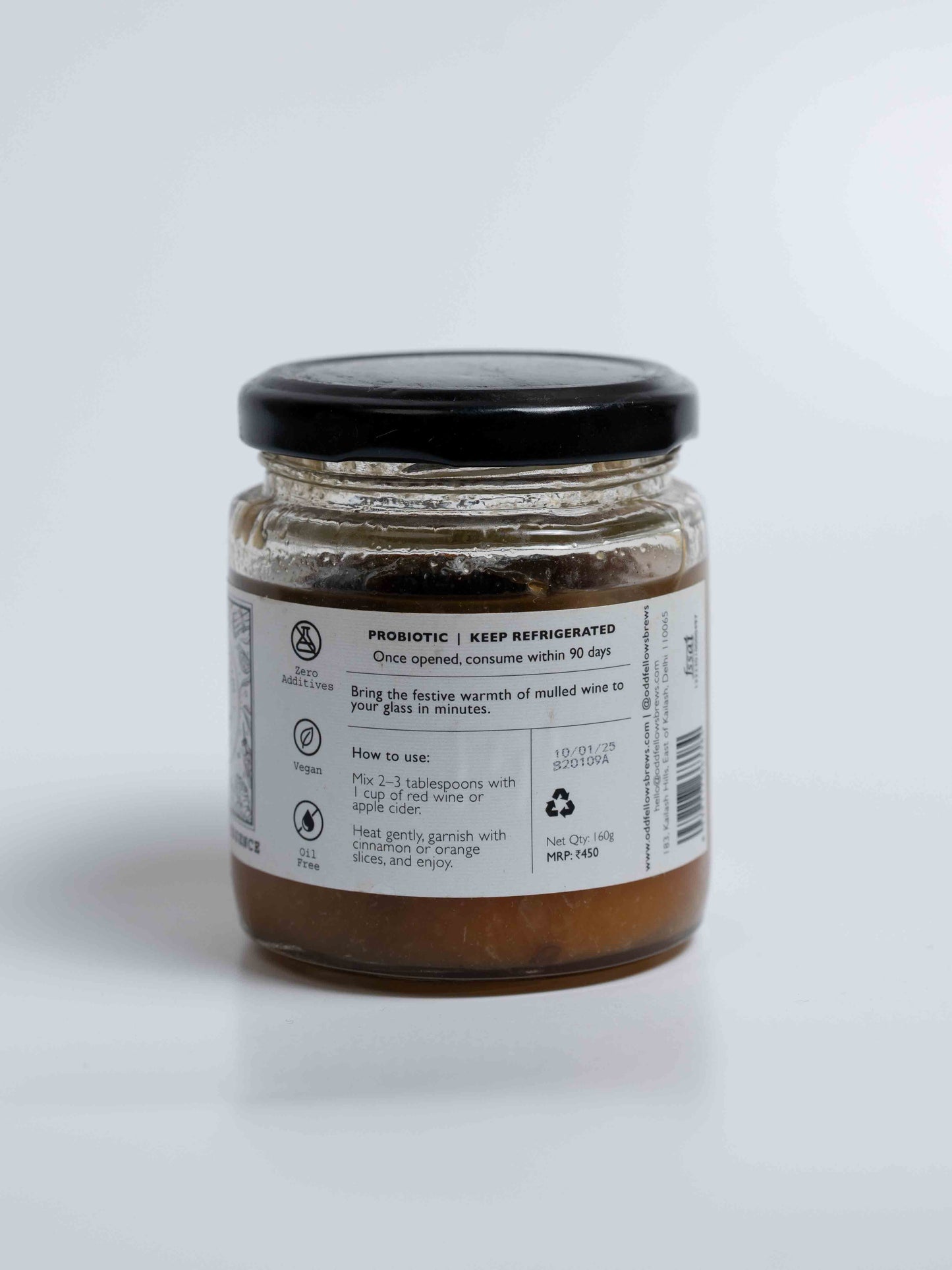 Jar of fermented mulled wine, side view
